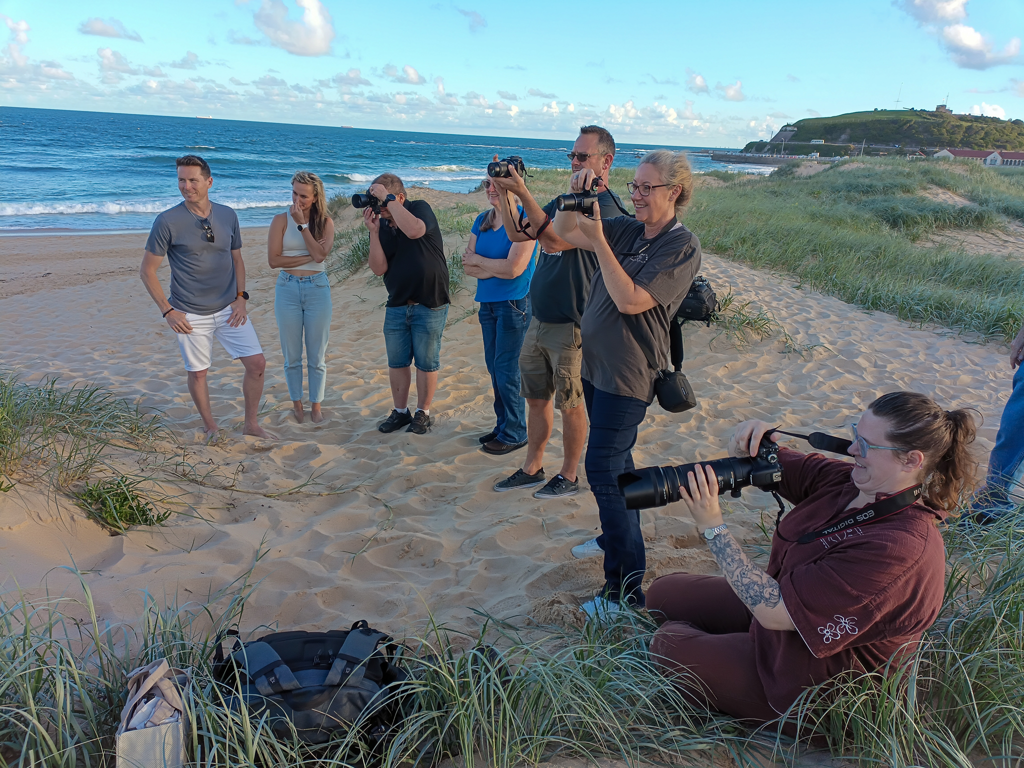 Photography workshop participants photographing at the coast