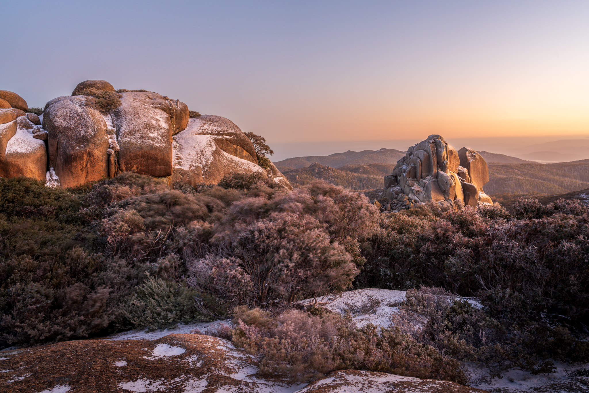 Granite formations at The Cathedral on Mount Buffalo illuminated by first light in the Victorian Alps.